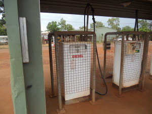 Condom vending machine discreetly located in a remote community petrol station.